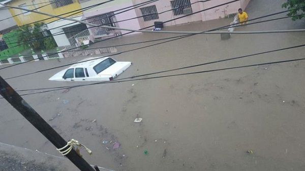 Lluvias dejan dos muertos e inundaciones en el Cibao