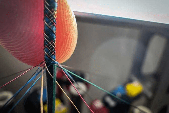Ordenador de fibra e integrable en ropa