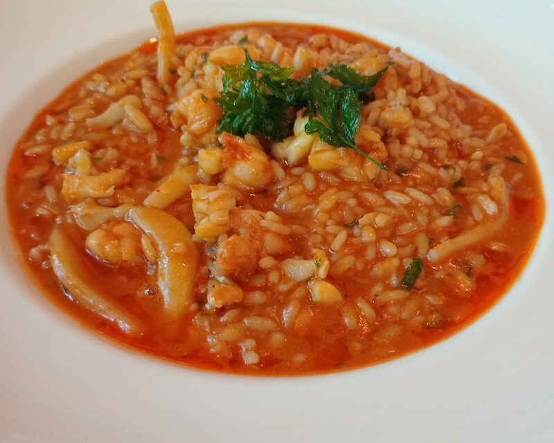 Almorzando en SD arroz meloso con langosta y sepia, ¡muy bueno!